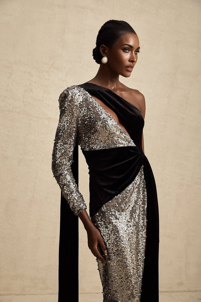 A long asymmetric maxi dress with sequin embellishments named Juliette featuring a sparkly design and uneven hemline