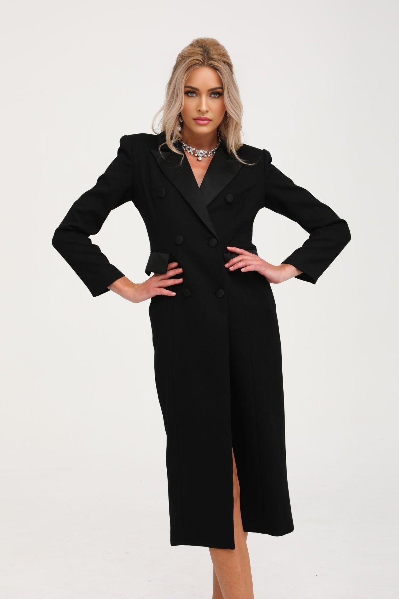 A long black doublebreasted coat named Eithne