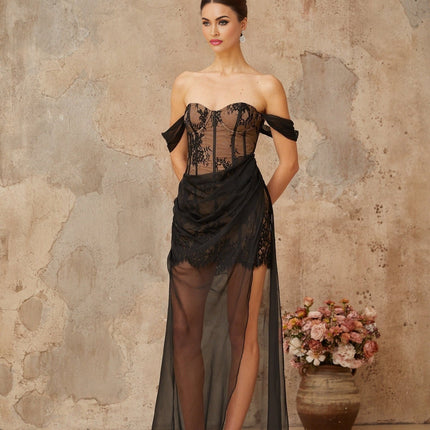 A long black dress with a floral lace corset bodice and tulle panels featuring a maxi length skirt
