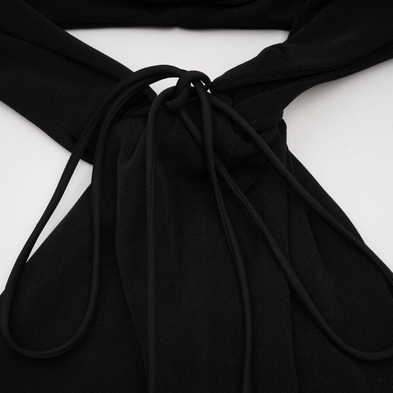 A long black hooded maxi dress with floral applique details named Axelle