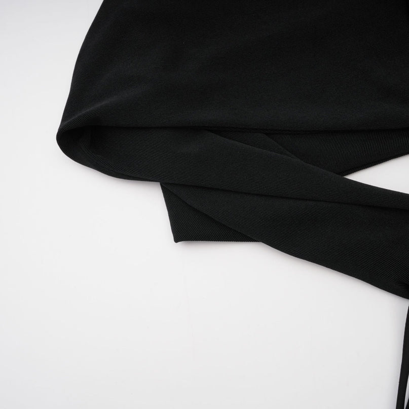 A long black hooded maxi dress with floral applique details named Axelle