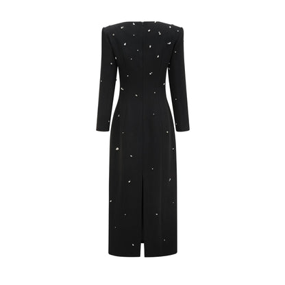 A long black maxi dress adorned with sparkling crystal embellishments elegant evening gown with a sleek silhouette
