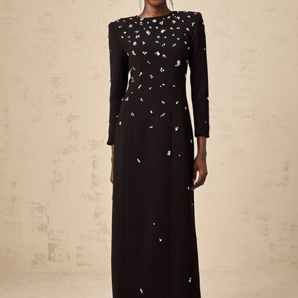 A long black maxi dress adorned with sparkling crystal embellishments elegant formal evening gown