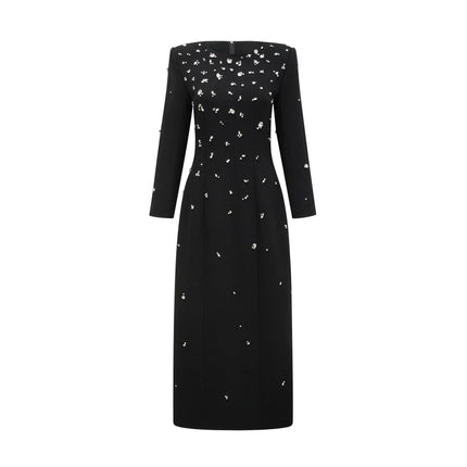 A long black maxi dress adorned with sparkling crystal embellishments