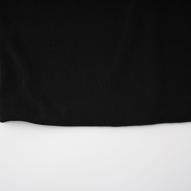 A long black maxi dress with a hood featuring floral appliques on the bodice