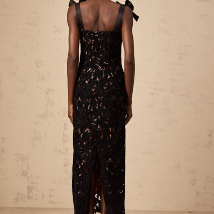 A long black maxi dress with floral embroidery details named Eloise