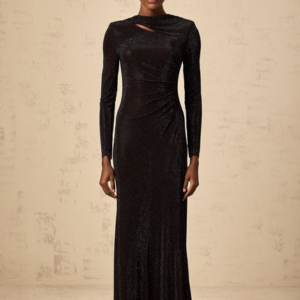 A long black maxi dress with ruched mesh fabric and rhinestone embellishments