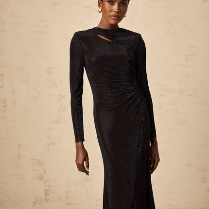 A long black maxi dress with ruched mesh fabric and rhinestone embellishments
