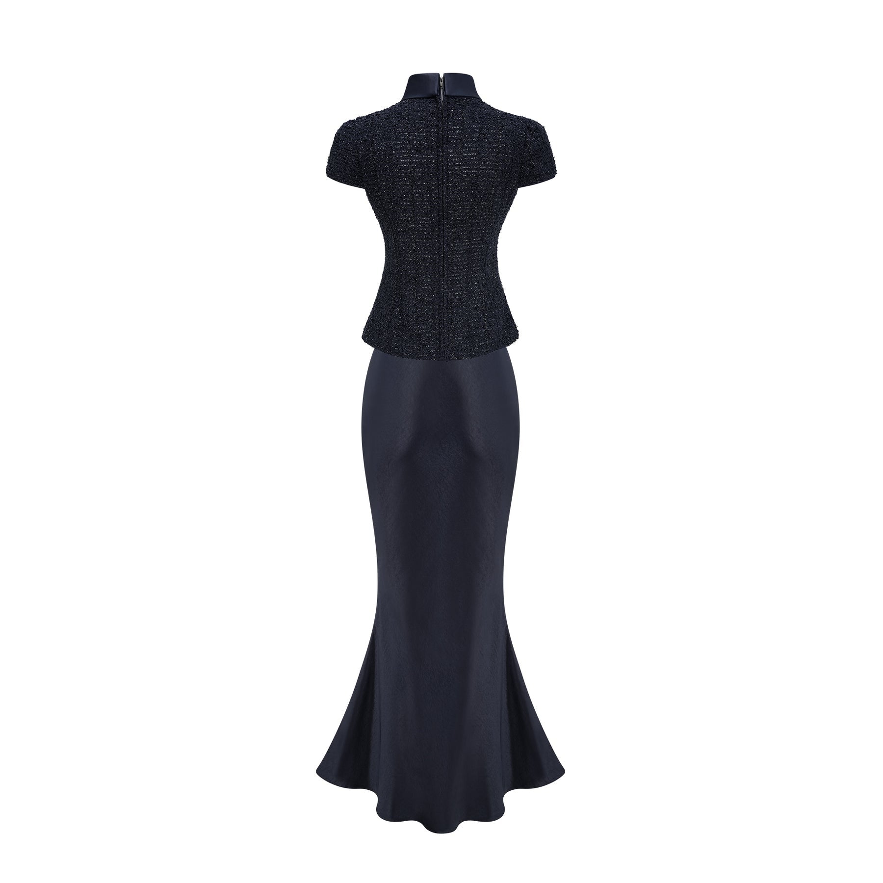 A long blue maxi dress with a fitted peplum waist and panelled design featuring a flowing skirt and feminine silhouette