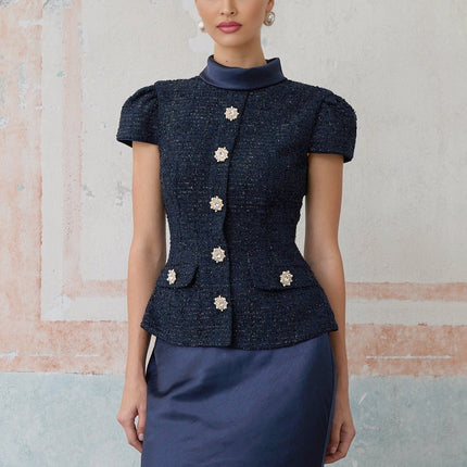 A long blue maxi dress with a peplum waist and panelled design named Josette