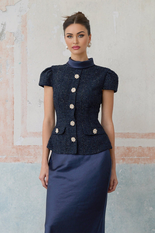 A long blue maxi dress with a peplum waist and panelled design named Josette