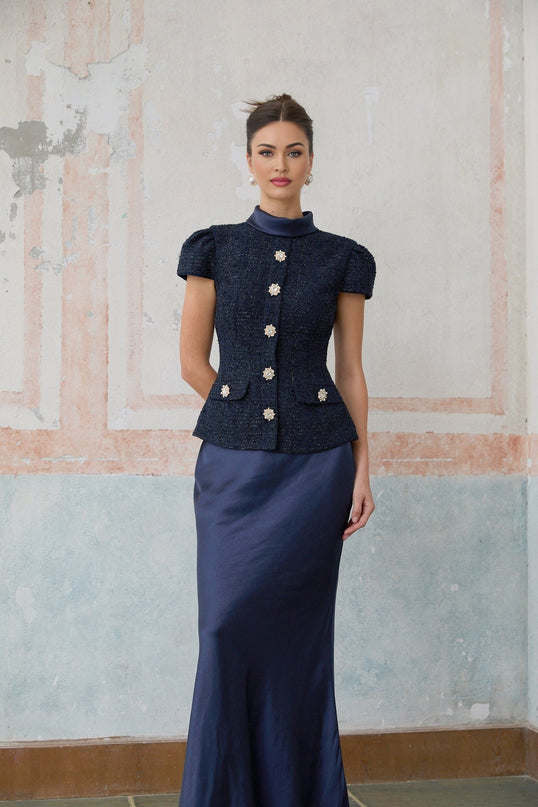 A long blue maxi dress with a peplum waist and panelled design named Josette