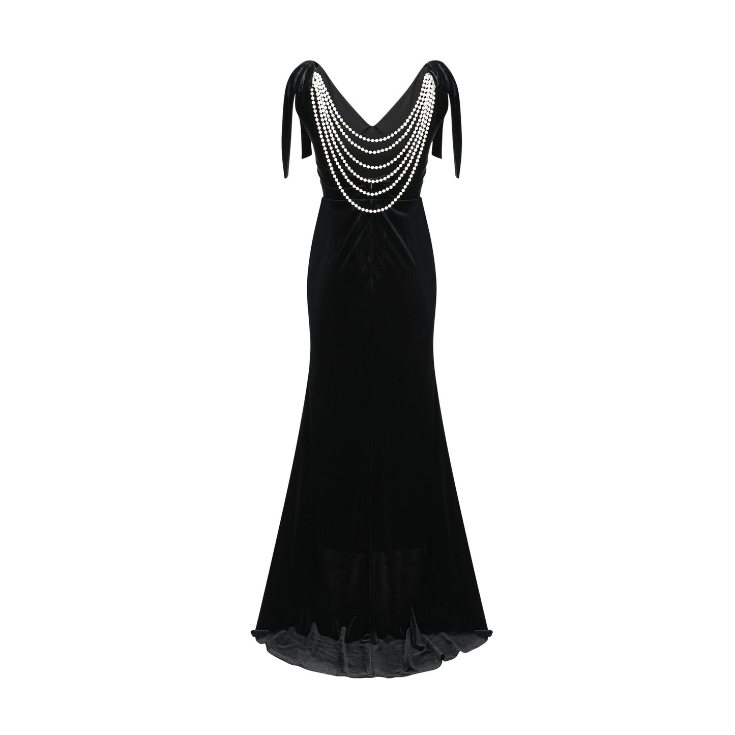 A long dark velvet dress with an open back and embellished details named Audrey shown on a model