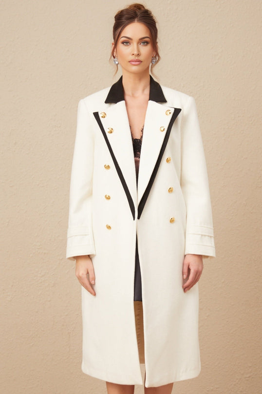 A long doublebreasted blazer made of wool featuring color blocking in shades of terracotta and beige with a tailored silhouette and notched lapels