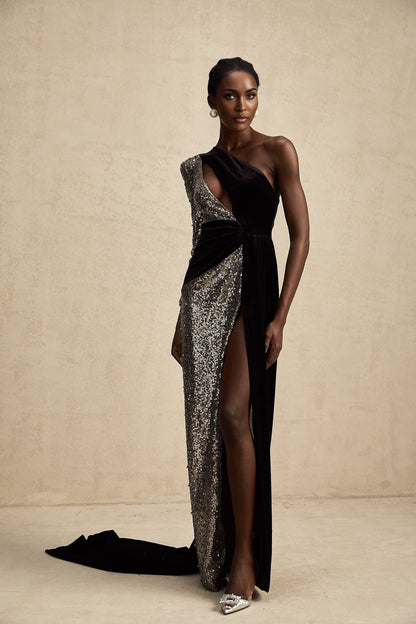 A long elegant maxi dress with an asymmetric design featuring shimmering sequin embellishments named Juliette