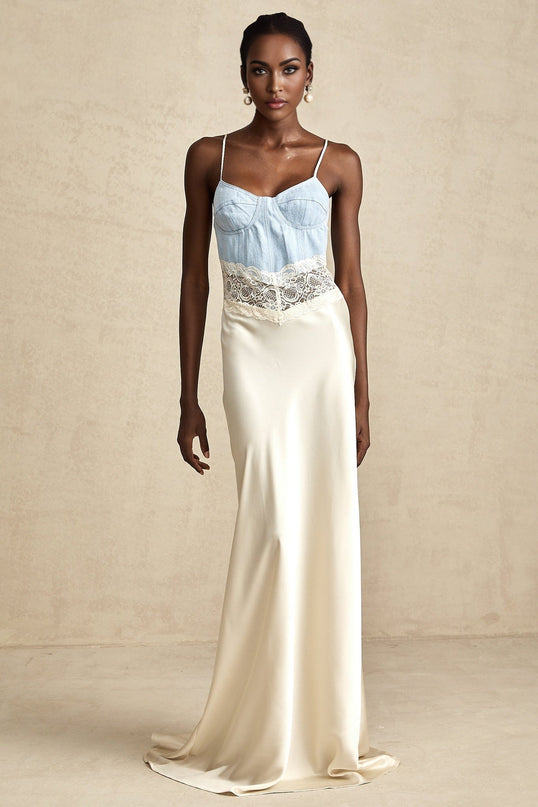A long elegant maxi dress with lace trim details and panelled design in a flowing silhouette
