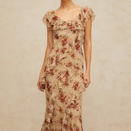 A long flared maxi dress with a floral print pattern and ruffled details