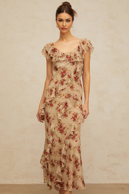 A long flared maxi dress with a floral print pattern and ruffled details