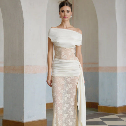 A long floral lace maxi dress in neutral tones with ribbon panelling details