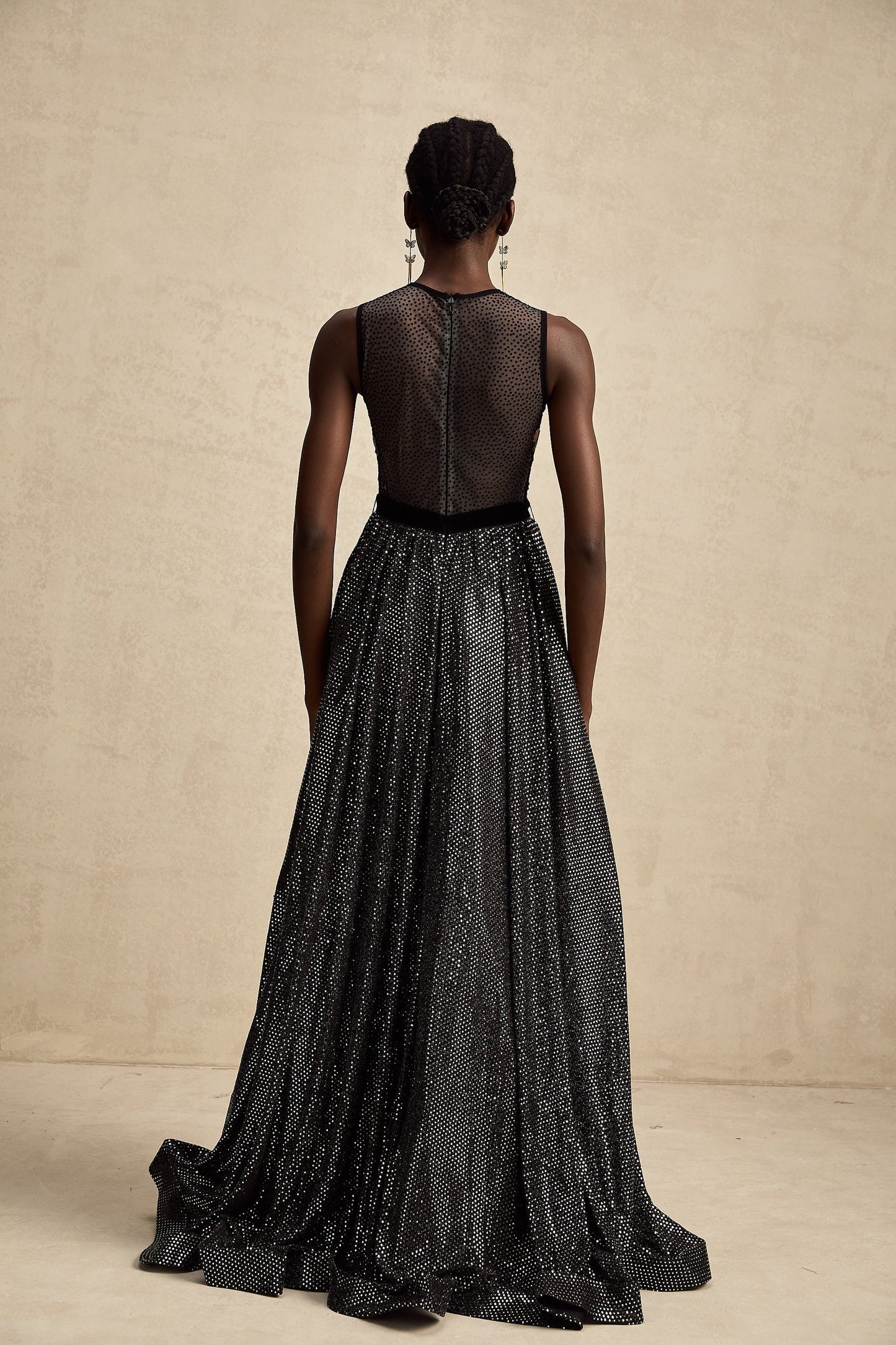 A long floral maxi dress with embroidery and embellishments featuring a delicate Agathe design pattern