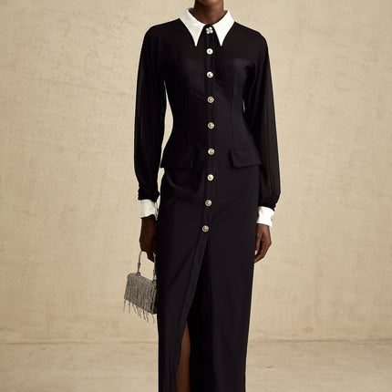 A long flowing maxi dress with contrasting colors and semisheer fabric featuring a light airy design and full length skirt