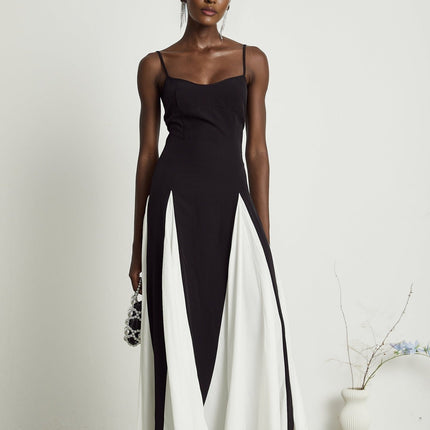 A long flowing pleated maxi dress in contrasting colors named Sofie