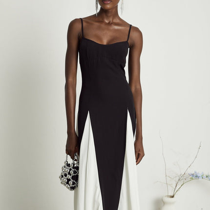 A long flowing pleated maxi dress in contrasting colors named Sofie