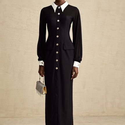 A long flowy maxi dress with contrasting colors and semisheer fabric featuring a lightweight and airy design