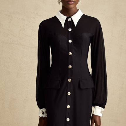 A long flowy maxi dress with contrasting colors and semisheer fabric showcasing a blend of opacity and translucence