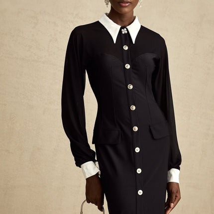 A long flowy maxi dress with contrasting colors and semisheer fabric