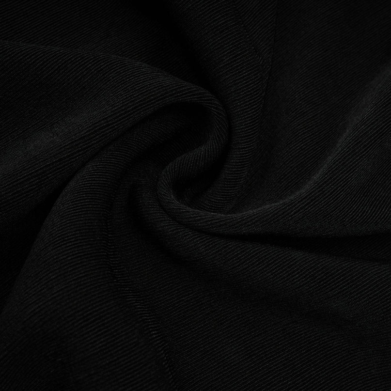 A long maxi dress with a vneck and contrasting color bowknot detail at the waist named Karine