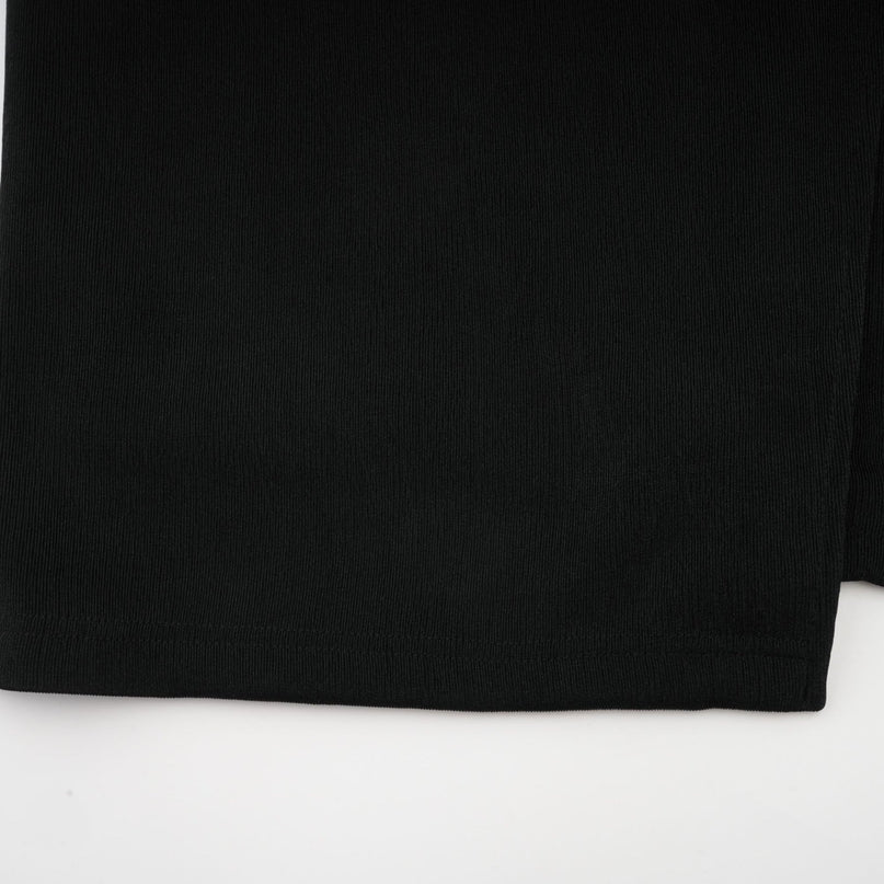 A long maxi dress with a vneck featuring a contrast color design and a prominent bowknot detail