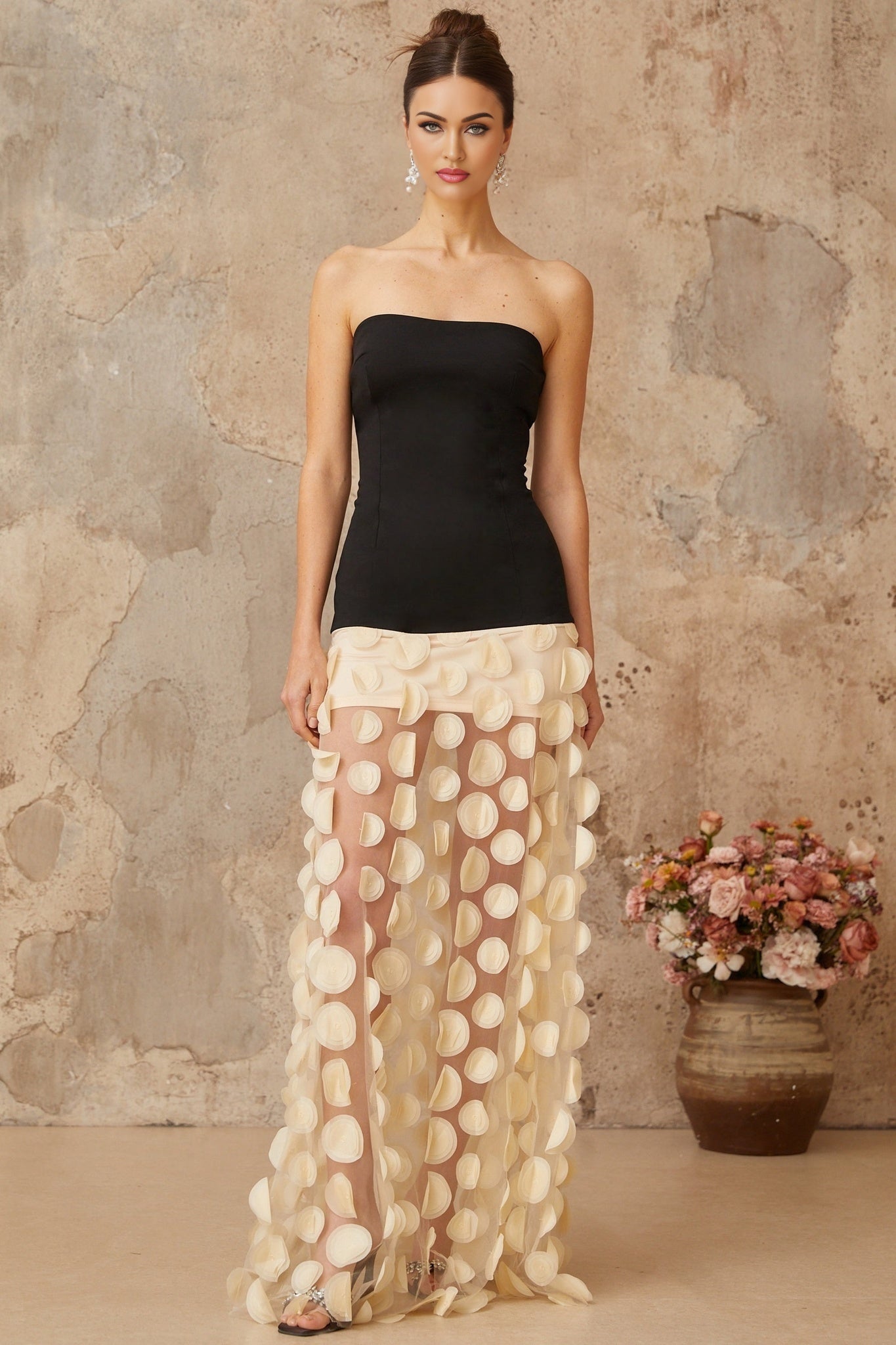 A long maxi dress with contrast colored 3D polka dot pattern named Xenia
