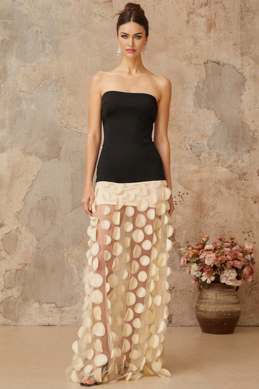 A long maxi dress with contrast colored 3D polka dot pattern named Xenia