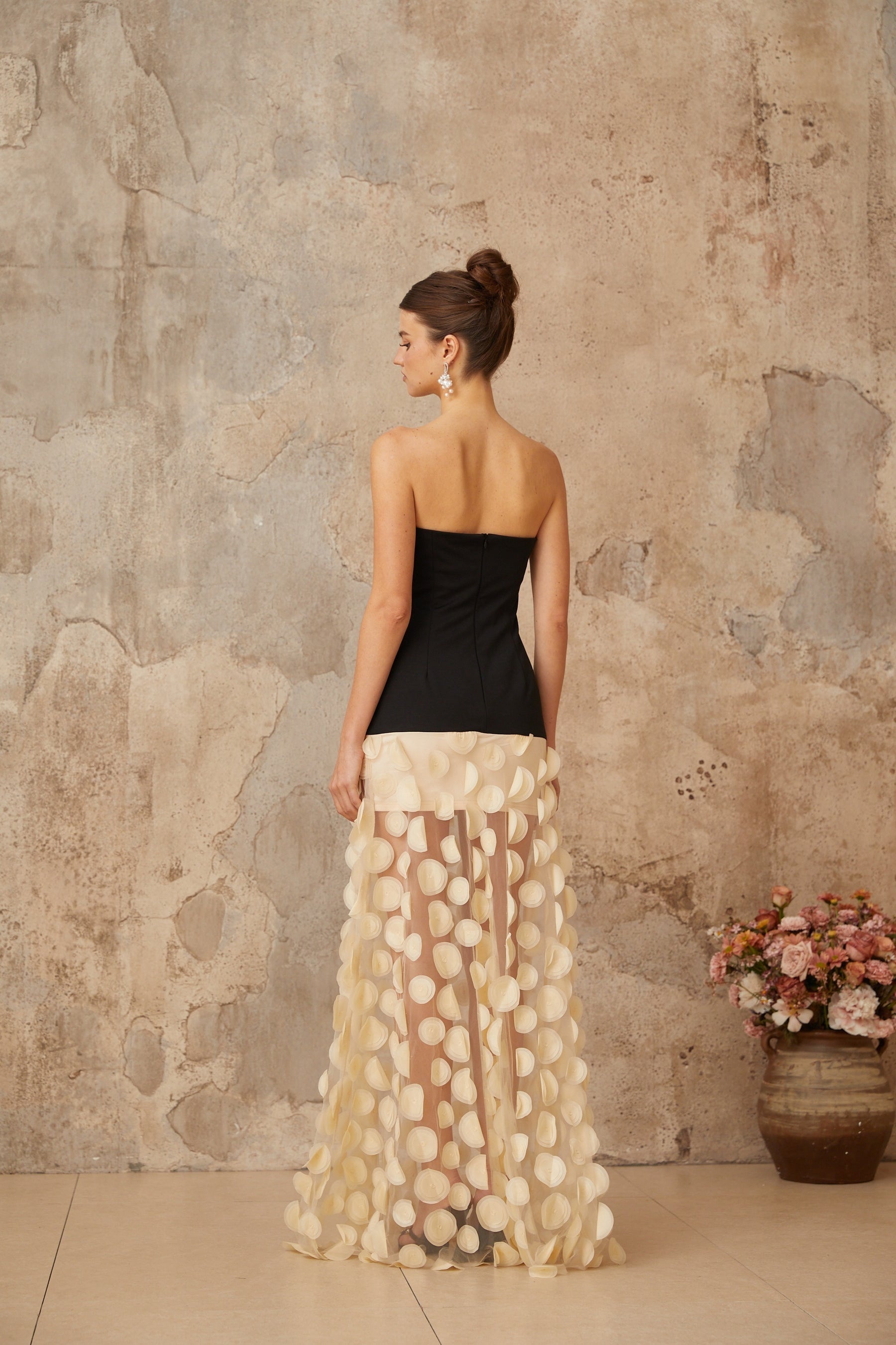 A long maxi dress with contrast colored three dimensional polka dot pattern named Xenia