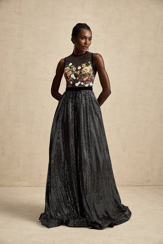 A long maxi dress with floral embroidery and embellishments featuring a design called Agathe