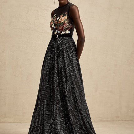 A long maxi dress with floral embroidery and embellishments featuring a design named Agathe