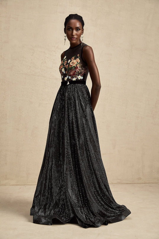 A long maxi dress with floral embroidery and embellishments featuring a design named Agathe