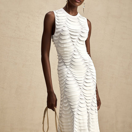 A long midi dress with a snake pattern design featuring a godet skirt and named Anna