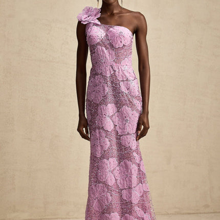 A long purple maxi dress with floral applique details