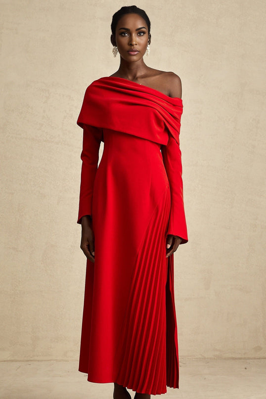A long red pleated maxi dress with a high slit for Valentines Day featuring a flowy design and romantic style