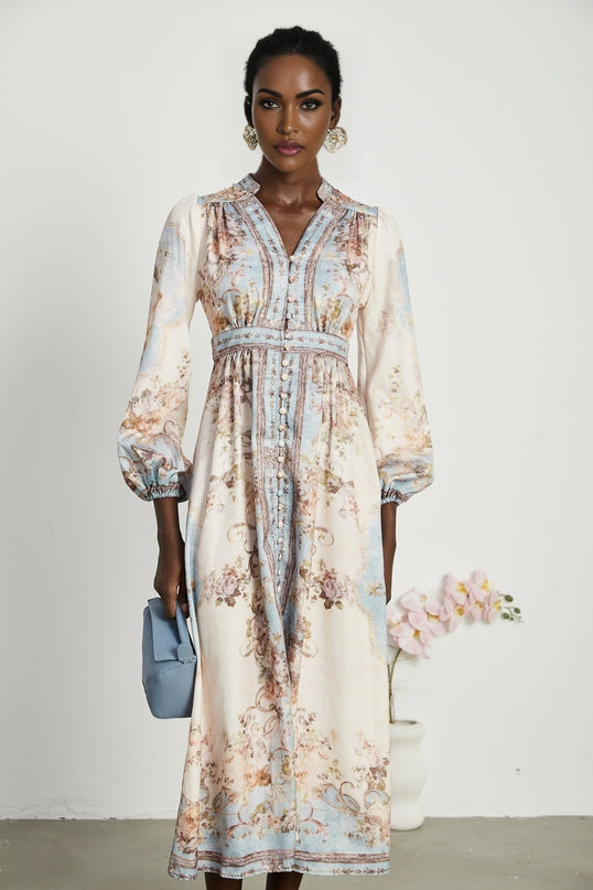 A long sleeve boho style dress with a floral print pattern called Camille