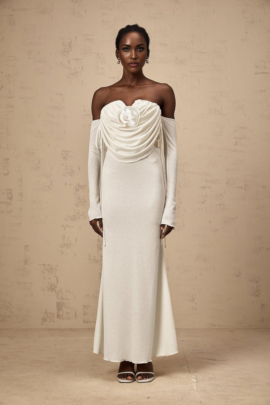 A long strapless maxi dress with ruched fabric featuring floral applique details named Julia