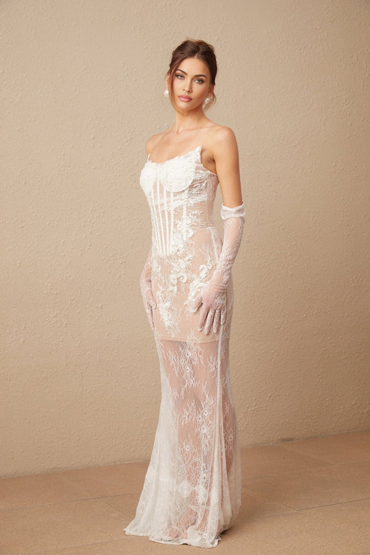 A long tulle maxi dress with a corset bodice featuring floral embroidery and a flowing skirt named Mila