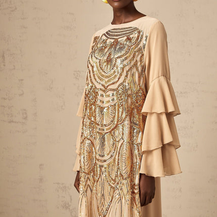 A long tulle maxi dress with sequin embellishments and ruffle sleeves named Noemi