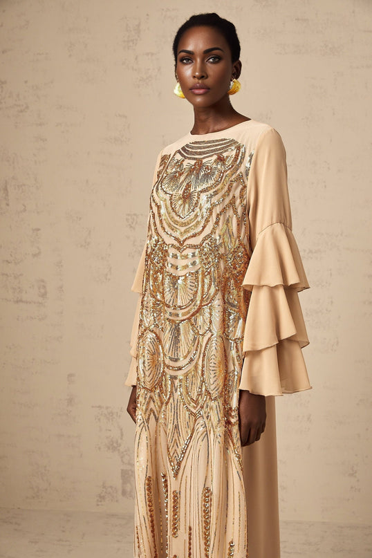A long tulle maxi dress with sequin embellishments and ruffle sleeves named Noemi
