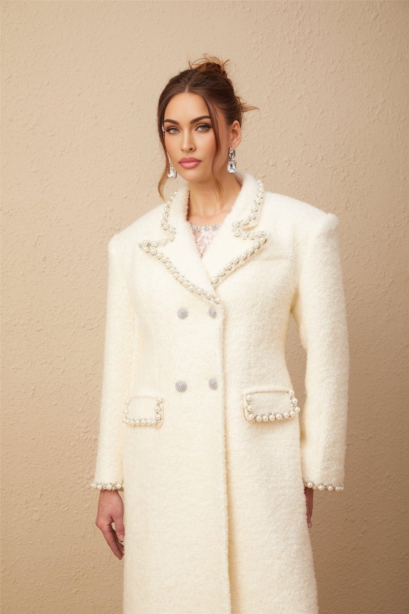 A long tweed coat in wool fabric with faux pearl embellishments Isotta style