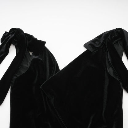 A long velvet maxi dress in dark color with an open back and embellished details named Audrey