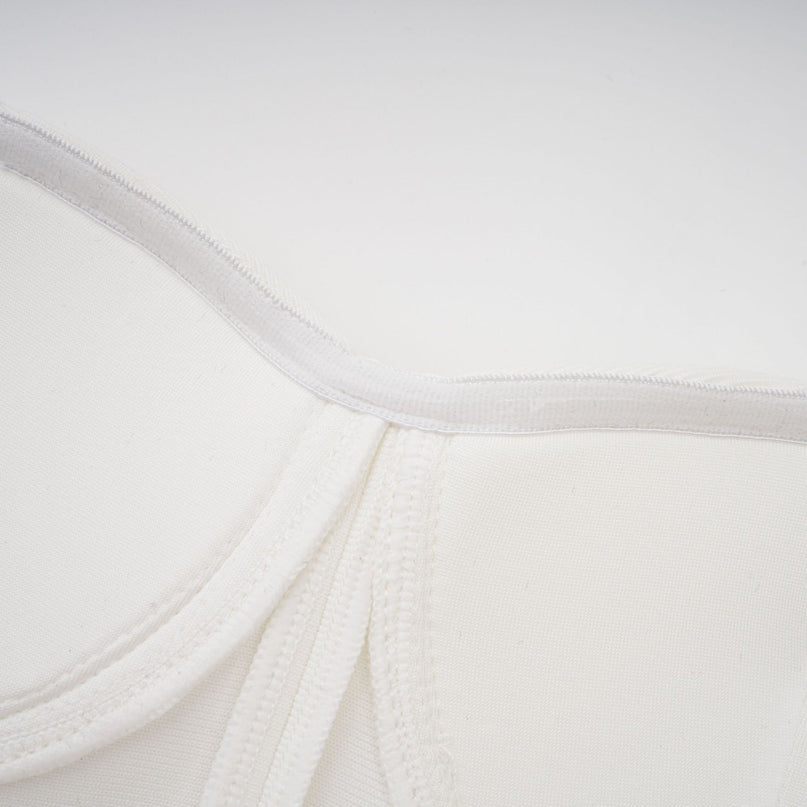 A long white bandage maxi dress with floral applique details named Olivia