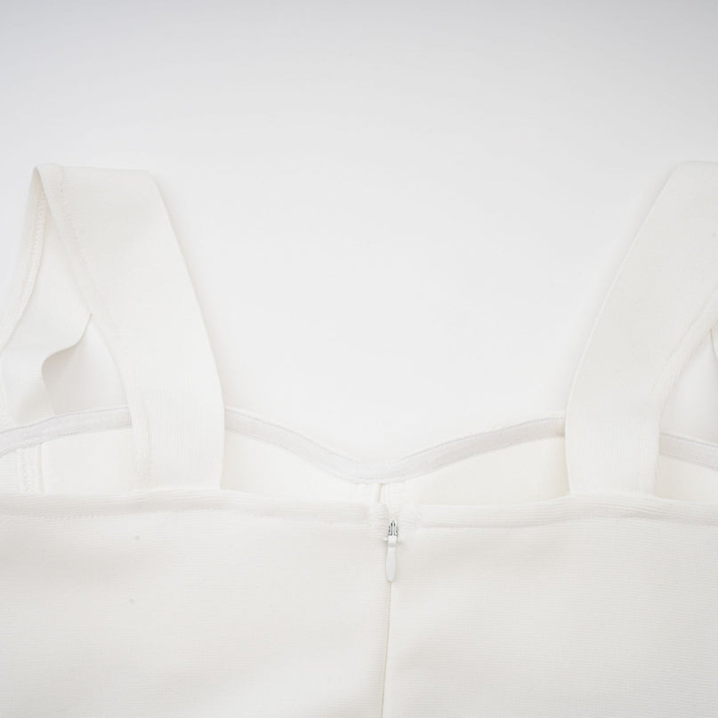 A long white bandage maxi dress with floral applique details named Olivia